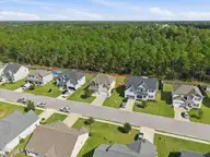 212 Independence Boulevard, Newport, NC 28570 — 4-bedroom home in Heritage Pointe, Newport, NC, photo 6 of 28: aerial front 2