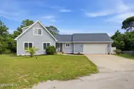 312 Pine Knoll Circle, Pine Knoll Shores, NC 28512 — 3-bedroom waterfront home in Pine Knoll Village, Pine Knoll Shores, NC, photo 1 of 54: 312PKC-2 new pics