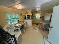 104 River Road, Blounts Creek, NC 27814 — 2-bedroom waterfront manufactured home in Crystal Beach, Blounts Creek, NC, photo 11 of 13: Dining