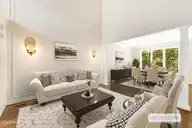 573 Coral Ridge Road, Pine Knoll Shores, NC 28512 — 4-bedroom waterfront home in Beacon's Reach, Pine Knoll Shores, NC, photo 6 of 59: Parlor