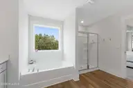 146 Ballantine Grove Lane, Newport, NC 28570 — 4-bedroom home in Ballantine Grove, Newport, NC, photo 20 of 51: Primary ensuite