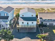 877 Ocean Boulevard W, Holden Beach, NC 28462 — 5-bedroom waterfront home in Colonial Beach, Holden Beach, NC, photo 2 of 63: 73-kahunaphoto