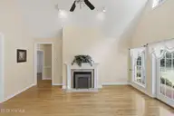 209 Small Drive, Elizabeth City, NC 27909 — 3-bedroom waterfront home in Newbegun Land, Elizabeth City, NC, photo 8 of 39: 209 Small View of fireplace in LR