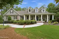 48 Kilbride Drive, Pinehurst, NC 28374 — 3-bedroom waterfront home in Pinewild CC, Pinehurst, NC, photo 1 of 71: 1-print-DSC05418