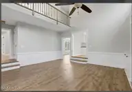 2204 Darien Place NW, Wilson, NC 27896 — 4-bedroom home in Waterford, Wilson, NC, photo 18 of 77: Step Down Family Room