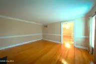 1008 Bateman Drive, Elizabeth City, NC 27909 — 4-bedroom waterfront home in Bateman Estates, Elizabeth City, NC, photo 11 of 74: Living Room 2