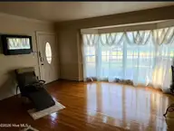 1210 Meadowood Drive, Kinston, NC 28501 — 4-bedroom home in Perry Park Extension, Kinston, NC, photo 24 of 41: Formal living room