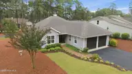 263 Champions Ridge Drive, Southern Pines, NC 28387 — 3-bedroom home in Mid South Club, Southern Pines, NC, photo 9 of 51: 5-web-or-mls-DJI_20260507134533_0158_D
