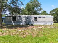 1912-1920 Triton Drive SW, Supply, NC 28462 — 2-bedroom manufactured home in Styrons Landing, Supply, NC, photo 1 of 20: 01-www.kahunaphoto.com-DJI_2025080202201