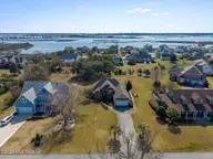 113 Lookout Ridge, Cedar Point, NC 28584 — 3-bedroom home in Magens Bay, Cedar Point, NC, photo 5 of 50: 17-DJI_20260311122515_0037_D_1-HDR-Edit