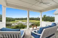 9279 Devaun Pointe Circle, Calabash, NC 28467 — 4-bedroom waterfront home in Devaun Park, Calabash, NC, photo 20 of 42: Second level covered porch
