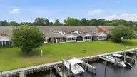 31 Pier Pointe, New Bern, NC 28562 — 3-bedroom waterfront townhome in River Bend, New Bern, NC, photo 3 of 60: 9-web-or-mls-DJI_20260610155337_0535_D_e