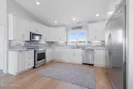 217 Salter Path Road, Pine Knoll Shores, NC 28512 — 4-bedroom waterfront home in Pine Knoll Association, Pine Knoll Shores, NC, photo 18 of 62: Kitchen