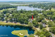 514 Woods Court SW, Sunset Beach, NC 28468 — 3-bedroom home in Sea Trail Plantation, Sunset Beach, NC, photo 9 of 50: 11-web-or-mls-8 overview with arrow