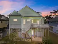111 SE 44th Street, Oak Island, NC 28465 — 4-bedroom home in Long Beach, Oak Island, NC, photo 2 of 58: 2-web-or-mls-DJI_20260309150319_0191_D.j