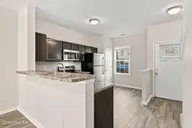 131 Beacon Woods Drive, Holly Ridge, NC 28445 — 2-bedroom townhome in The Townes At Holly Ridge, Holly Ridge, NC, photo 10 of 38: Breakfast Bar