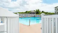9201 Coast Guard Road E-101, Emerald Isle, NC 28594 — 3-bedroom waterfront condo in Pebble Beach, Emerald Isle, NC, photo 8 of 50: 1 of 2 pools