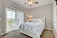 208 Goldsboro Drive, North Topsail Beach, NC 28460 — 6-bedroom waterfront townhome in Topsail Wynds, North Topsail Beach, NC, photo 22 of 51: bed 3