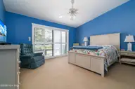 142 Lagoon Lane, Pine Knoll Shores, NC 28512 — 3-bedroom waterfront condo in Mcginnis Point, Pine Knoll Shores, NC, photo 17 of 41: Main Level Master Suite