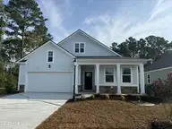 1205 Woodhouse Drive NW, Ash, NC 28420 — 4-bedroom home in Brunswick Plantation, Ash, NC, photo 1 of 31