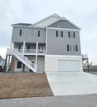 157 Big Hammock Point Road, Sneads Ferry, NC 28460 — 4-bedroom waterfront home in Pelican Point, Sneads Ferry, NC, photo 1 of 59