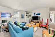 1530 Salter Path Road 15, Indian Beach, NC 28512 — 2-bedroom waterfront manufactured home in Tradewinds, Indian Beach, NC, photo 13 of 32: Living Room