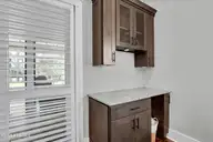 135 Spicer Lake Drive, Holly Ridge, NC 28445 — 4-bedroom waterfront home in Summerhouse On Everett Bay, Holly Ridge, NC, photo 19 of 75: Dry Bar