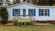 4100 Masonboro Loop Road, Wilmington, NC 28409 — 3-bedroom manufactured home in Navaho Woods, Wilmington, NC, photo 2 of 25: 4100-Masonboro-Loop-Rd-03252026_205348