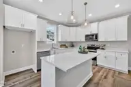 9575 Lily Pond Court NE, Leland, NC 28451 — 4-bedroom home in Lily Pond, Leland, NC, photo 8 of 37: Quarts countertops