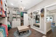 133 Sound Point Drive, Harkers Island, NC 28531 — 3-bedroom waterfront home in Cape Point Village, Harkers Island, NC, photo 23 of 61: Primary suite dressing room