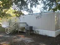 1934 Creswell Place SW, Supply, NC 28462 — 2-bedroom manufactured home in Styrons Landing, Supply, NC, photo 3 of 17: Back View