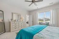 9414 Barnstormer Drive, Carolina Shores, NC 28467 — 3-bedroom waterfront home in Eagle Run, Carolina Shores, NC, photo 20 of 41: Primary Bedroom