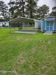 708 Elma Drive, Kinston, NC 28501 — manufactured home, Kinston, NC, photo 6 of 12: Carport and storage shed