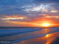 14 202 Mourning Warbler Trail, Bald Head Island, NC 28461 — waterfront lot in BHI (Bald Head Island), Bald Head Island, NC, photo 13 of 16: SUNSETS