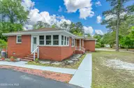 4602 Mockingbird Lane, Wilmington, NC 28409 — 3-bedroom home in Long Leaf Hills, Wilmington, NC, photo 2 of 34: Side Exterior