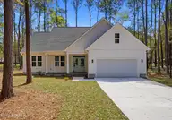 665 Cypress Grove Court SE, Bolivia, NC 28422 — 3-bedroom home in River Run Plantation, Bolivia, NC, photo 1 of 36: 665 Cypress Court