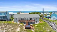 101 Ocean Drive, Emerald Isle, NC 28594 — 7-bedroom waterfront home, Emerald Isle, NC, photo 3 of 73: OnTheBeach-Drone-5-17-26-005