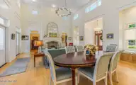 124 Chesterfield Drive, Pinehurst, NC 28374 — 4-bedroom home in Forest Creek, Pinehurst, NC, photo 8 of 56: Dining table to living