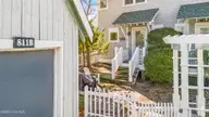 811 S Bald Head Wynd # B, Bald Head Island, NC 28461 — 3-bedroom waterfront townhome in BHI Stage I & II Flora's Bluff, Bald Head Island, NC, photo 10 of 54: DJI_20260217105704_0006_D-Edit