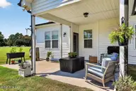 1200 Caracara Drive, New Bern, NC 28560 — 3-bedroom home in Fairfield Harbour, New Bern, NC, photo 22 of 31: Relaxing Porch