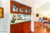 65 Lake Hills Road, Pinehurst, NC 28374 — 2-bedroom home in Unit 6, Pinehurst, NC, photo 15 of 43: Wet bar from Living/Dining Room