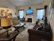 235 Woodgreen Drive, Aberdeen, NC 28315 — 3-bedroom home in Woodgreen, Aberdeen, NC, photo 5 of 21: wdgrliv2
