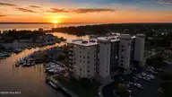 4425 Arendell Street 304, Morehead City, NC 28557 — 3-bedroom waterfront condo in HarborSide Club at 70W, Morehead City, NC, photo 2 of 42: sunset building pic