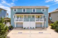 7803 Ocean Drive East, Emerald Isle, NC 28594 — 4-bedroom waterfront townhome, Emerald Isle, NC, photo 1 of 62: 7803 Ocean Dr. Front