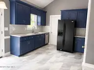 2205 Seagrave Drive, Winterville, NC 28590 — 3-bedroom home in Fieldstream, Winterville, NC, photo 8 of 27: 2205 - kitchen with sink