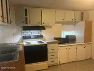 843 Giles Place NE, Leland, NC 28451 — 2-bedroom manufactured home in Picket Ridge, Leland, NC, photo 17 of 22