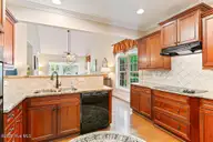 140 Shadow Creek Court, Pinehurst, NC 28374 — 2-bedroom townhome in Villas at Forest Hills, Pinehurst, NC, photo 9 of 39: Kitchen