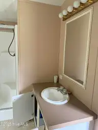 202 Stephen Willis Road, Smyrna, NC 28579 — 3-bedroom manufactured home, Smyrna, NC, photo 16 of 20: IMG_0811