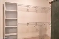 255 Champions Ridge Drive, Southern Pines, NC 28387 — 3-bedroom home in Mid South Club, Southern Pines, NC, photo 23 of 56: Master Closet