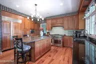 60 Woodenbridge Lane, Pinehurst, NC 28374 — 4-bedroom waterfront home in National, Pinehurst, NC, photo 13 of 76: Kitchen3